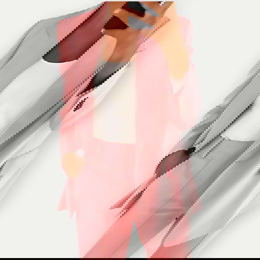 Chic women's tailored blazer and trouser set, elegant business attire with a modern fit, ideal for office or formal events.