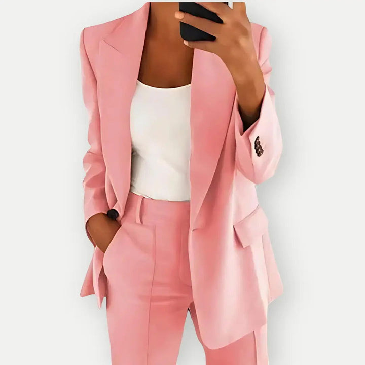 Chic women's tailored blazer and trouser set, elegant business attire with a modern fit, ideal for office or formal events.