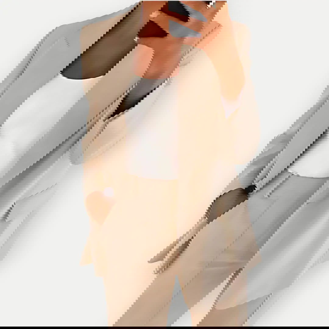 Chic women's tailored blazer and trouser set, elegant business attire with a modern fit, ideal for office or formal events.