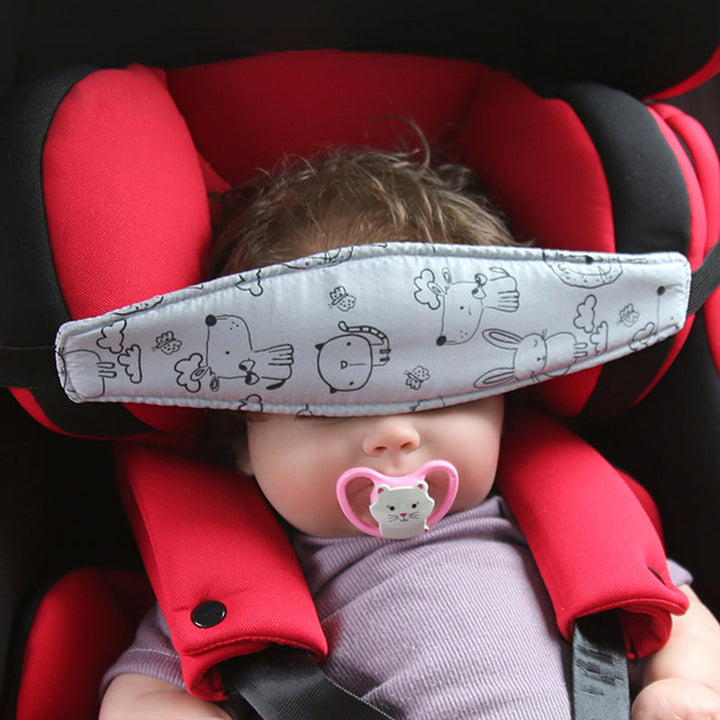 Children's car seat head support pillow for toddlers, ensuring comfort & neck stability during long car travel.