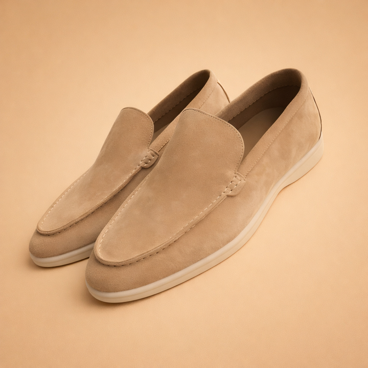 Comfortable beige men's slip-on penny loafers, ideal for everyday elegant fashion.