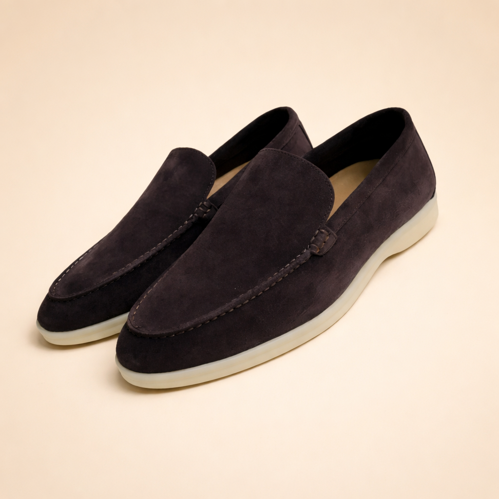 Elegant light blue men's slip-on loafers, comfortable everyday footwear, versatile for men's fashion.