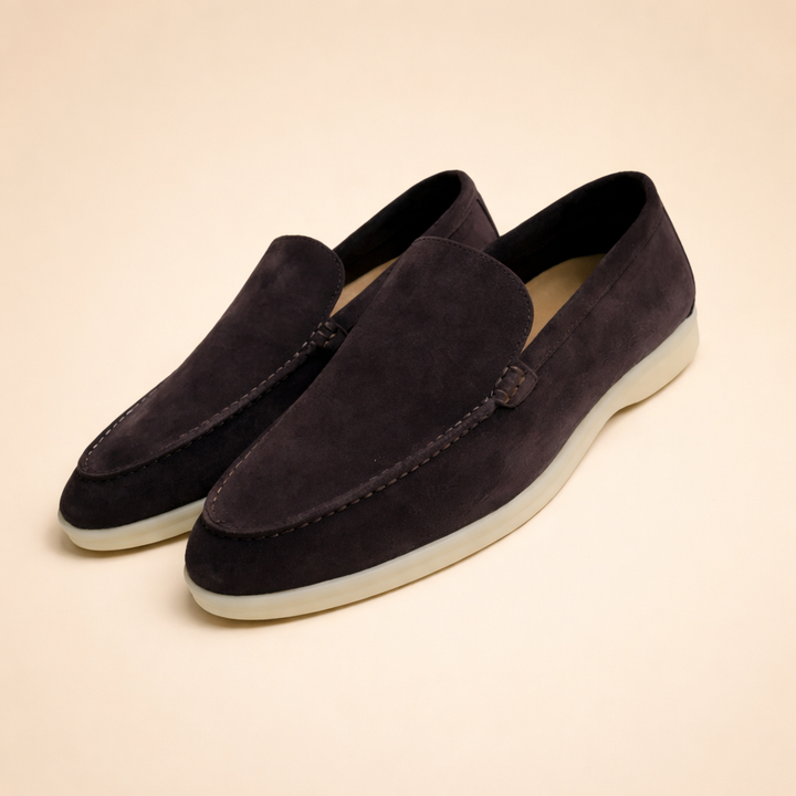 Elegant light blue men's slip-on loafers, comfortable everyday footwear, versatile for men's fashion.
