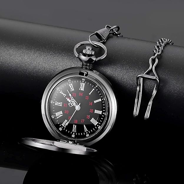 Detailed close-up of a vintage men's pocket watch dial with classic Roman numerals, elegant accessory.
