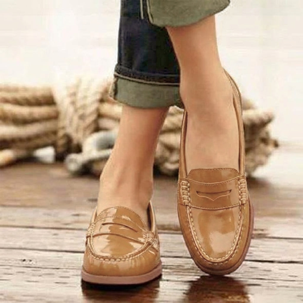 Timeless women's slip-on loafers, chic and easy to wear, offering comfortable and smart casual style for work.