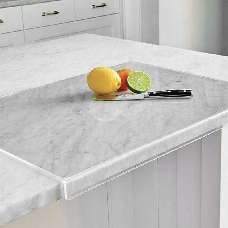 Clear non-slip acrylic cutting board with sturdy feet for hygienic kitchen food prep & chopping.