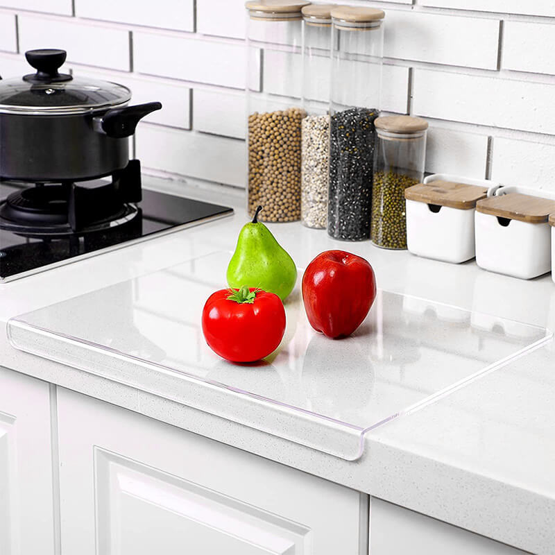 Durable & hygienic non-slip acrylic cutting board for safe kitchen food prep. Easy to clean transparent surface.