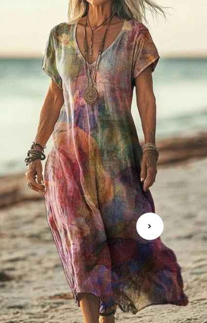 Comfortable women's floral midi dress with an elastic waist for a relaxed fit.