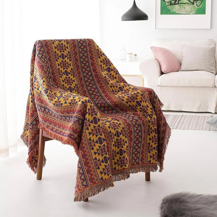 "Colorful bohemian tassel knitted sofa throw, featuring bright patterns and ethnic tassel details for vibrant home decor."