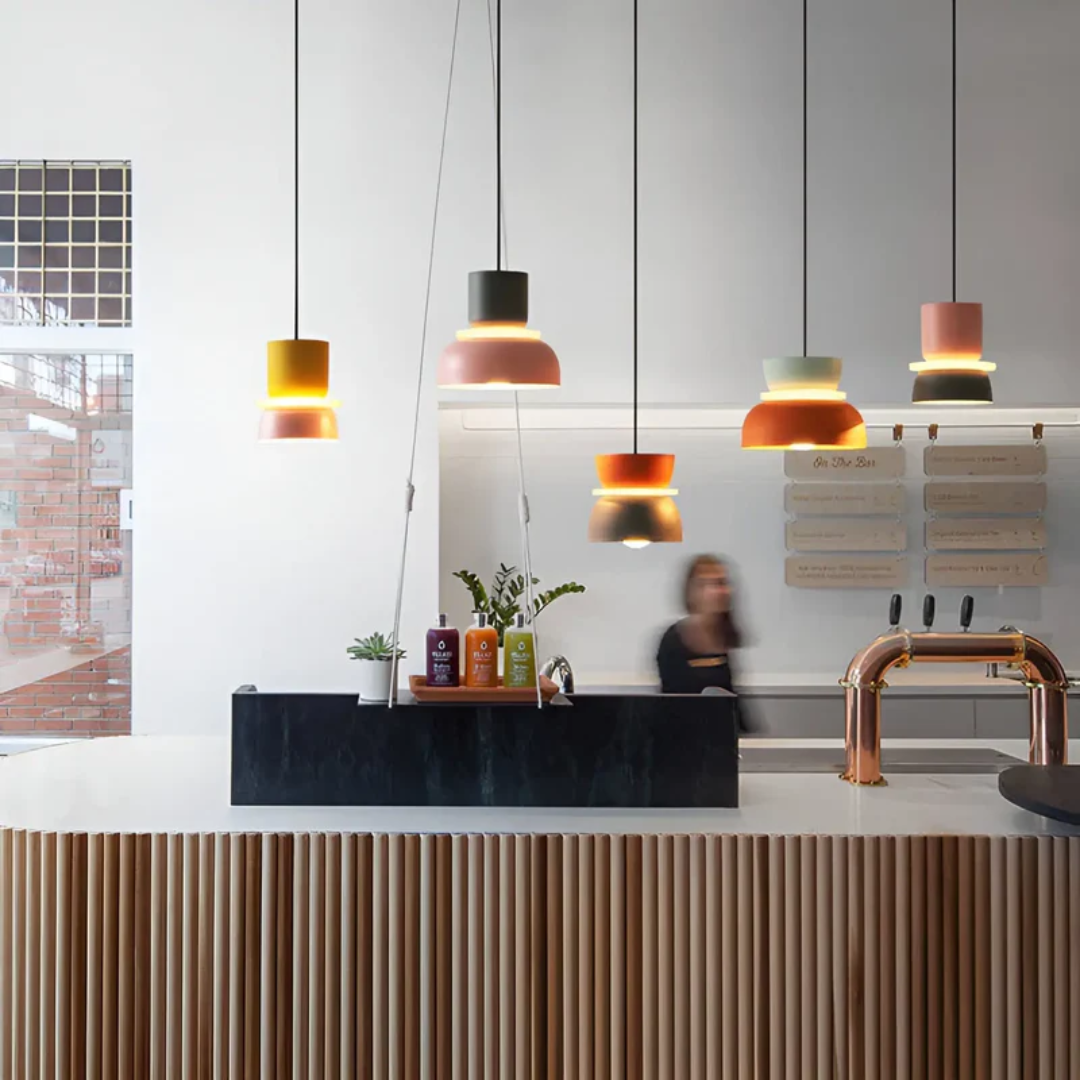 Vibrant Macaron LED pendant light; modern home lighting fixture, energy-efficient choice.