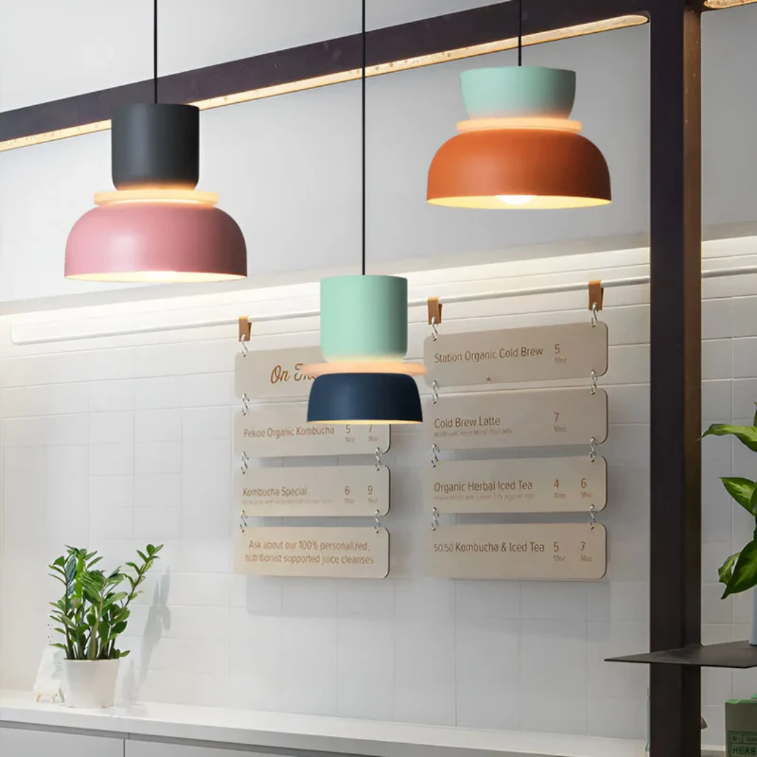 Colorful Macaron LED hanging lamp; trendy designer lighting piece for unique home decor.