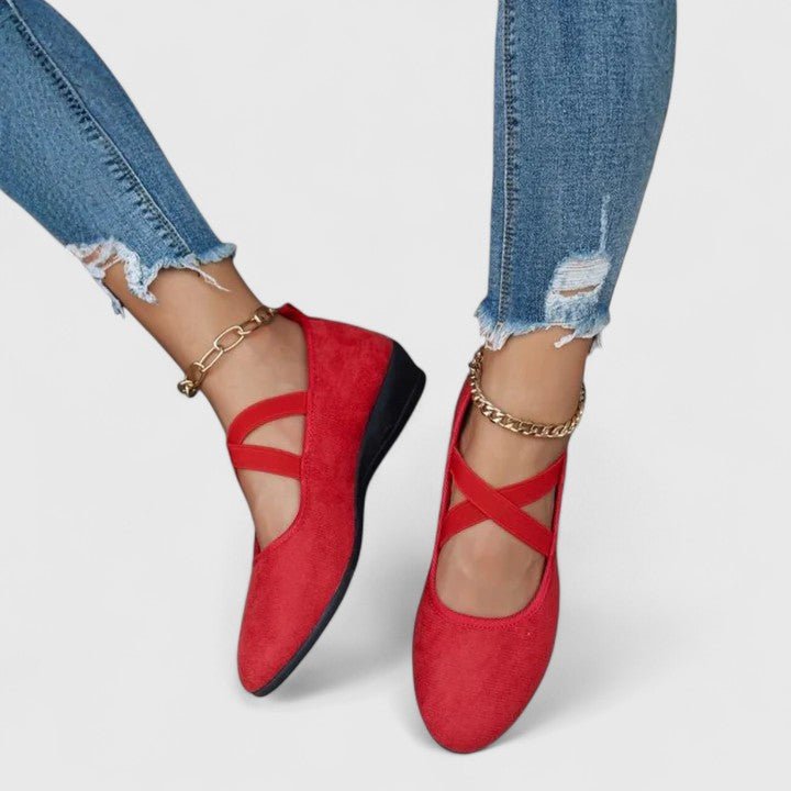 Chic women's cross-strap ballet flats, providing comfort and style for versatile everyday wear.