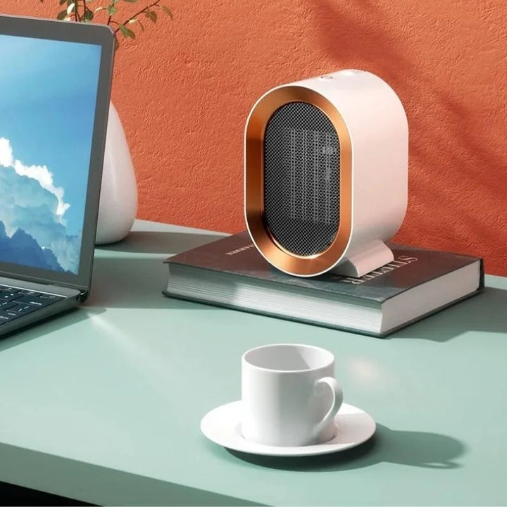 Compact electric heater with sleek design, available in blue, green, and white, perfect for desk or office use.