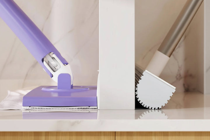 A user cleaning a kitchen floor with a compact 360° swivel mini mop for quick, efficient tidying.
