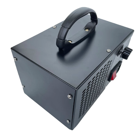 "Compact silver and white ozone generator for home air purification; eliminates odours, mould, and airborne particles."