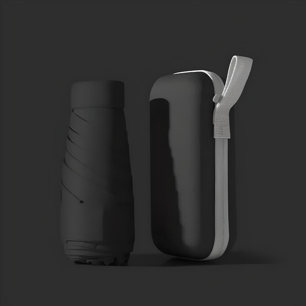 Compact travel umbrella with waterproof case for easy portability & rain protection.