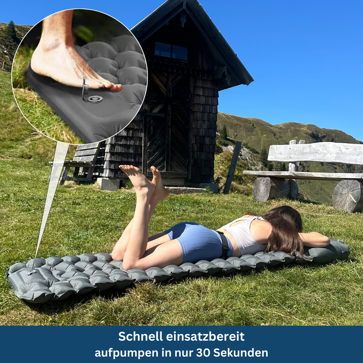 "Compact ultralight sleeping pad in Elephant Gray, perfect for camping and travel, folds small for easy packing."