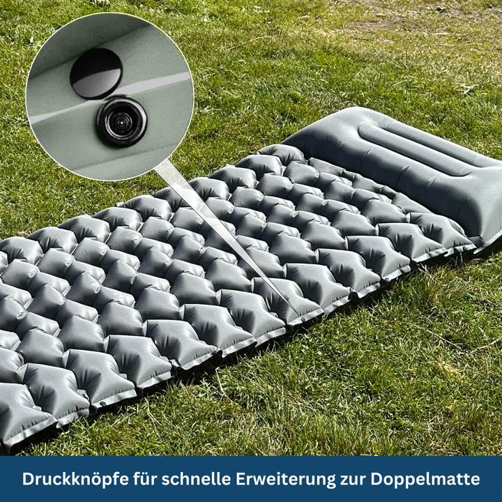 "Compact ultralight sleeping pad in Elephant Gray, perfect for camping and travel, folds small for easy packing."