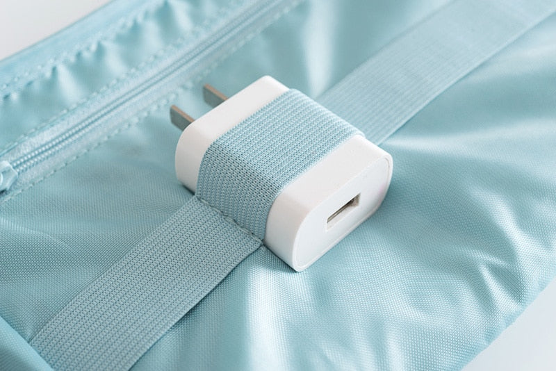 Compact tech organizer for travel, a waterproof solution for managing all your essential electronics.