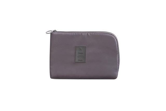 Portable tech bag, a unisex waterproof electronics organizer, perfect for keeping gadgets neat on the go.