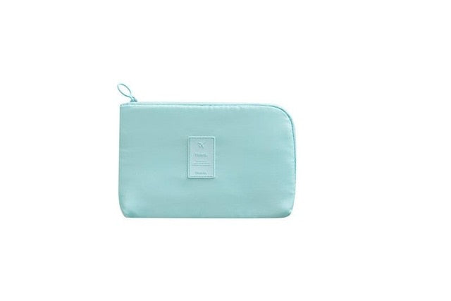 Compact gadget organizer, a travel essential for keeping your electronics dry and well-managed.