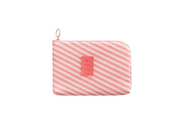 Durable electronics organizer, waterproof and compact, ideal for safe transport of cables & travel tech.