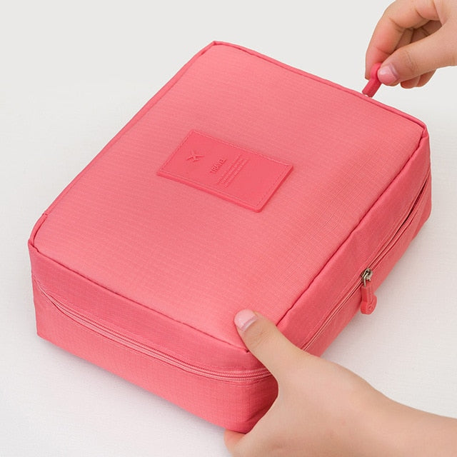 Close-up of durable fabric: women's waterproof makeup travel organizer bag.