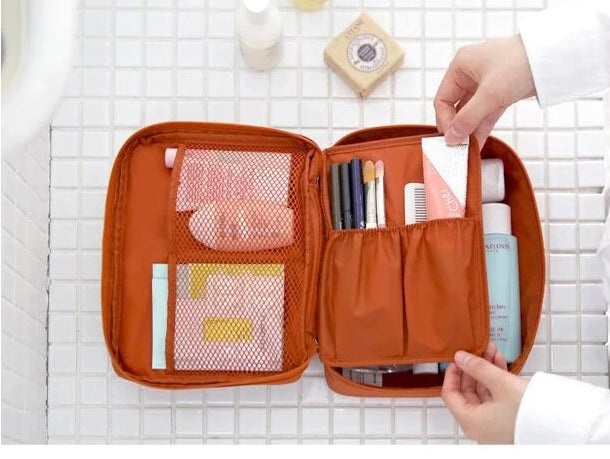 Portable waterproof cosmetic travel case, ideal women's makeup storage solution.
