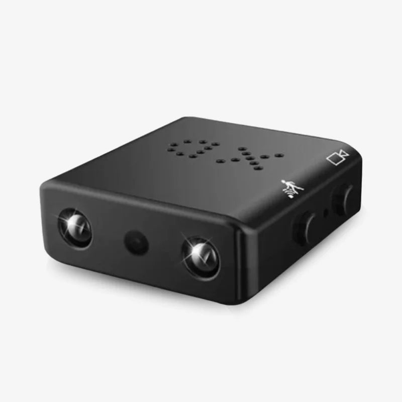 Compact Wifi Micro HD video camera with audio, coin-sized, sleek design, offers 1080p resolution and wireless connectivity.