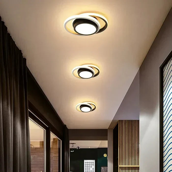 Elegant double ring LED ceiling lamp, ideal modern lighting for living rooms & offices.