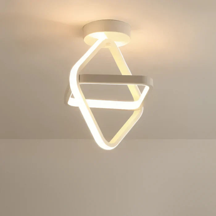 Chic black double ring LED ceiling lamp, modern lighting fixture for stylish interior design.