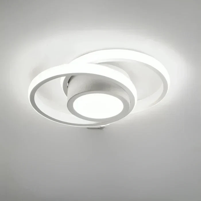 Stylish double ring LED ceiling light, warm white glow, perfect modern lighting for any room.