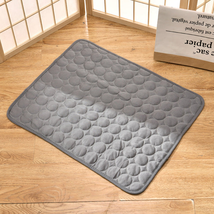Cooling mat for pets in light grey, offering instant heat relief. Eco-friendly, durable, suitable for indoor/outdoor use.