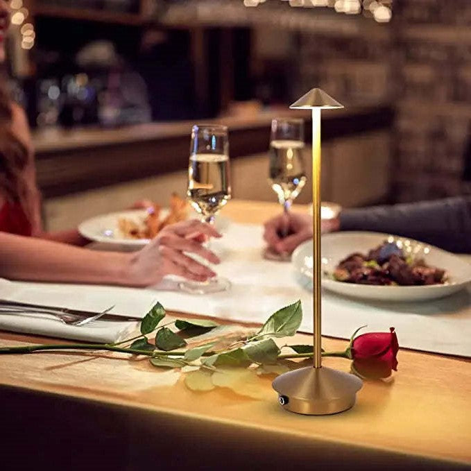 "Cordless rechargeable table lamp, sleek pine-like design, touch control, USB-powered, waterproof, dimmable LED lighting."