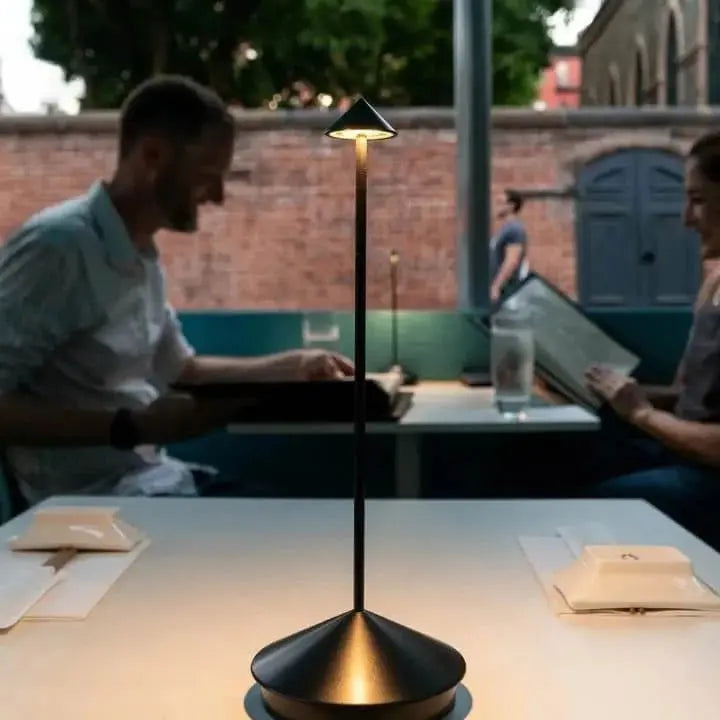 "Cordless rechargeable table lamp, sleek pine-like design, touch control, USB-powered, waterproof, dimmable LED lighting."