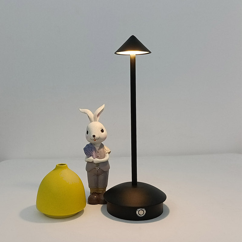 "Cordless rechargeable table lamp, sleek pine-like design, touch control, USB-powered, waterproof, dimmable LED lighting."