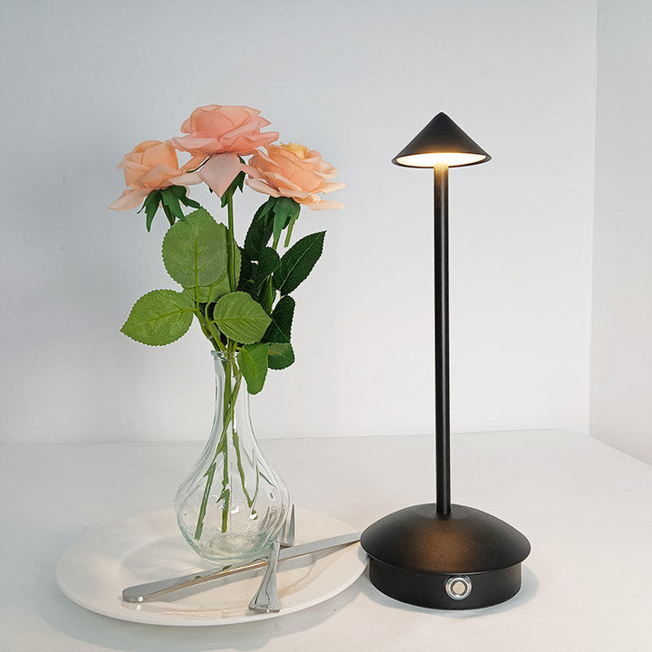 "Cordless rechargeable table lamp, sleek pine-like design, touch control, USB-powered, waterproof, dimmable LED lighting."