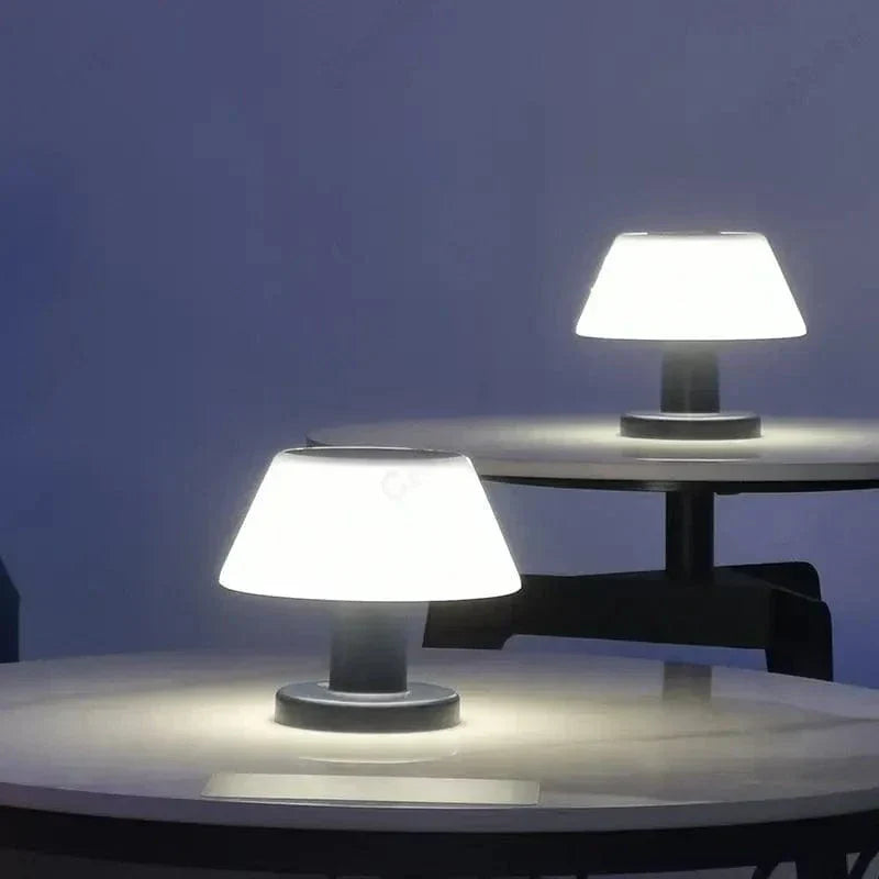 Cordless solar table lamp with LED, rechargeable via USB Type-C, features a sleek, minimalist design, perfect for outdoor use