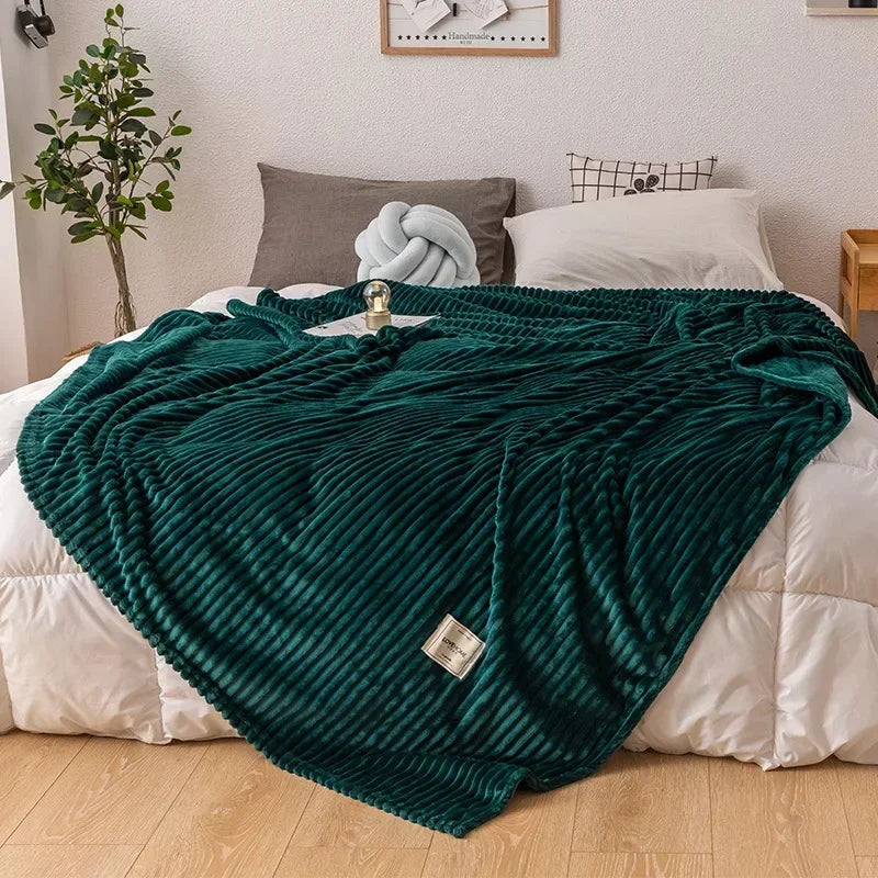 Close-up of a thick, soft flannel throw blanket, showcasing its cozy texture and warm comfort. Ideal for autumn.