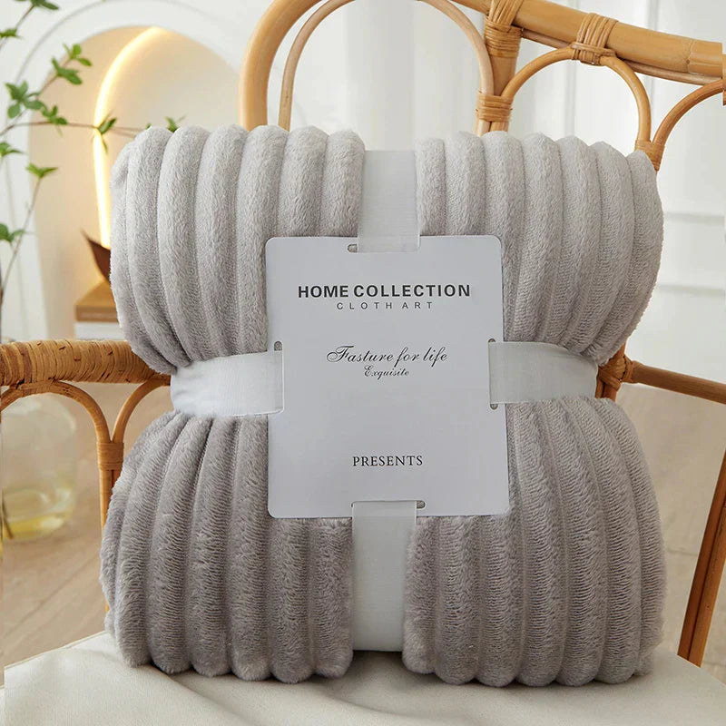 Deluxe wide striped flannel fleece blanket, a comfortable and stylish home accent.
