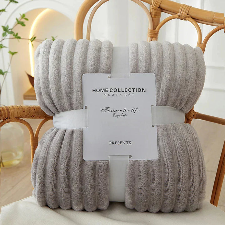 Deluxe wide striped flannel fleece blanket, a comfortable and stylish home accent.