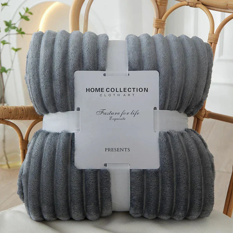 Stylish wide striped flannel blanket, a cozy home decor accent for any room.