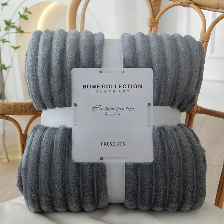 Stylish wide striped flannel blanket, a cozy home decor accent for any room.