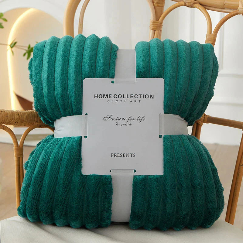 Comforting wide striped fleece throw blanket for a cozy living room experience.