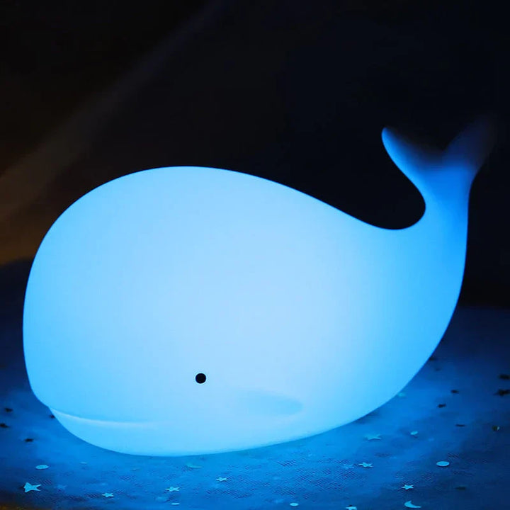 Soothing color-changing LED whale night light, soft silicone touch, perfect for children's bedroom & nursery.