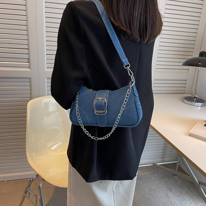 Elegant dark blue women's two-way buckle shoulder bag, perfect versatile fashion handbag.