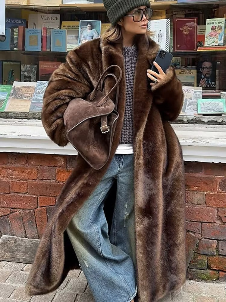 Dark brown women's long plush winter coat. Cozy, elegant, and warm oversized outerwear for cold weather.