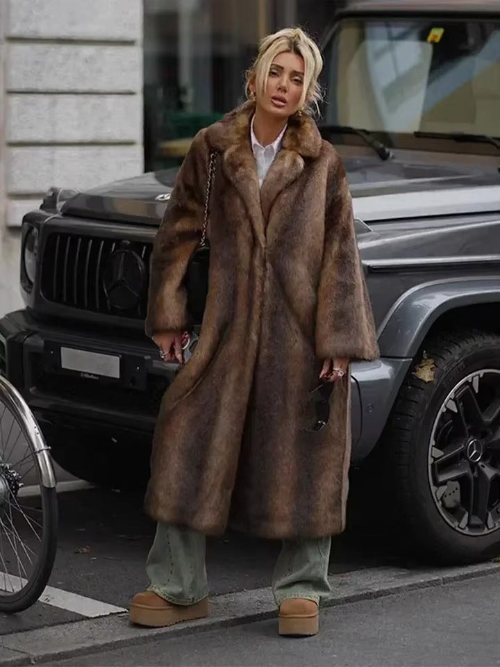 Warm & elegant dark brown long plush winter coat. Chic women's outerwear with a cozy oversized fit.