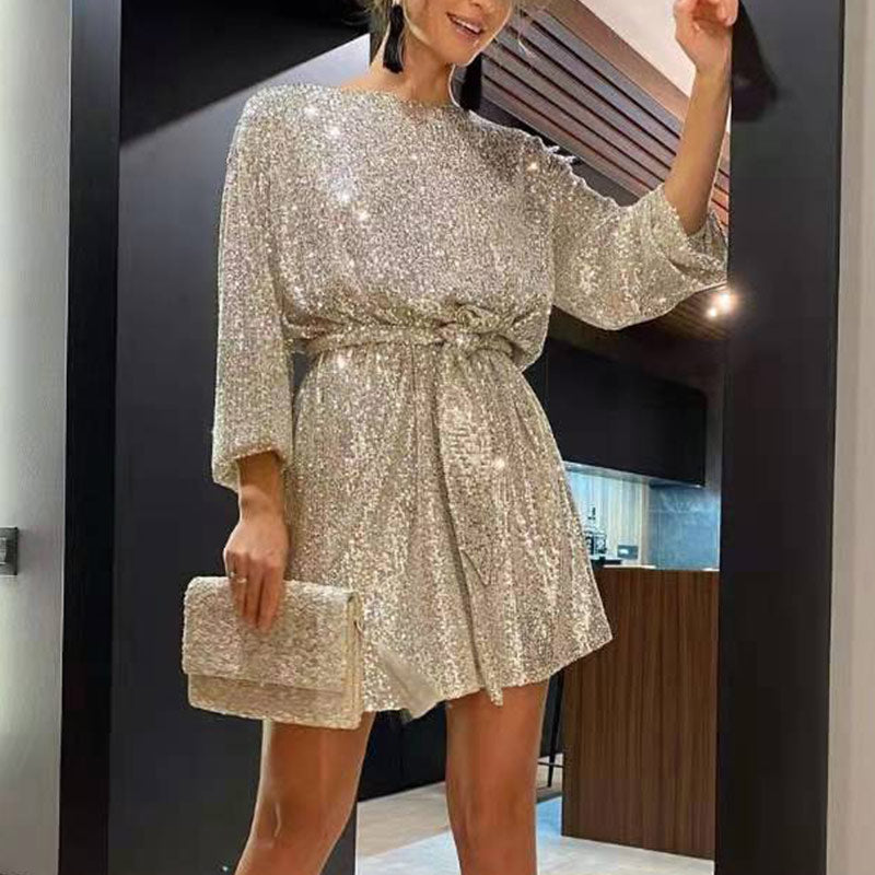 Dazzling women's sequin mini cocktail dress with long sleeves, perfect for parties & special occasions.