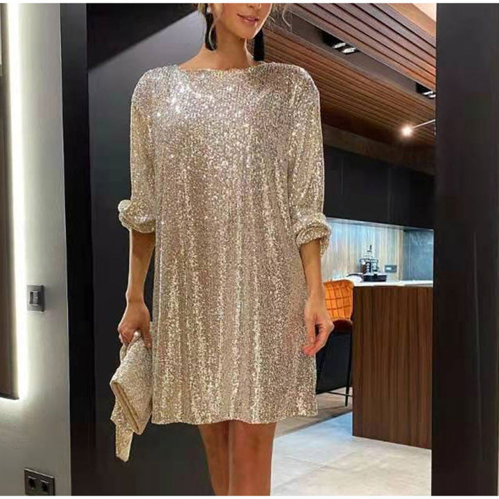 Glamorous gold sequin mini party dress for women, featuring elegant long sleeves and a short hemline.